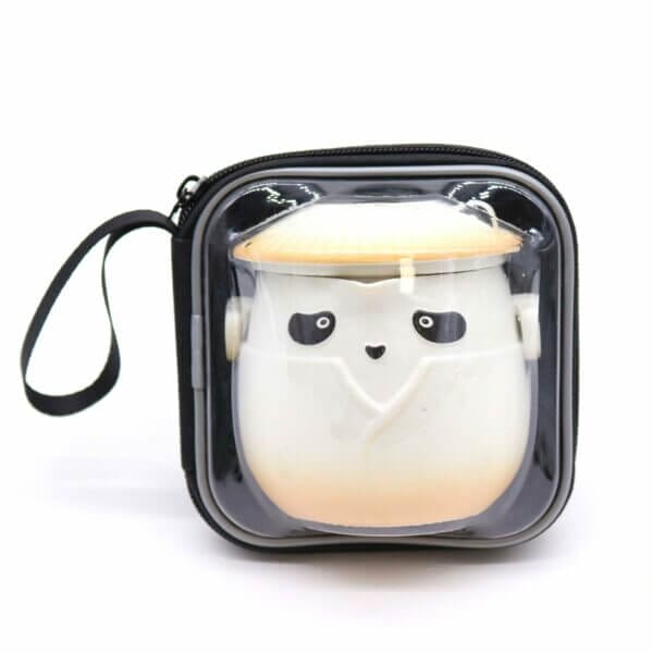 A round, white container with a panda face and a conical hat, enclosed in a clear, square zippered case with a side handle.