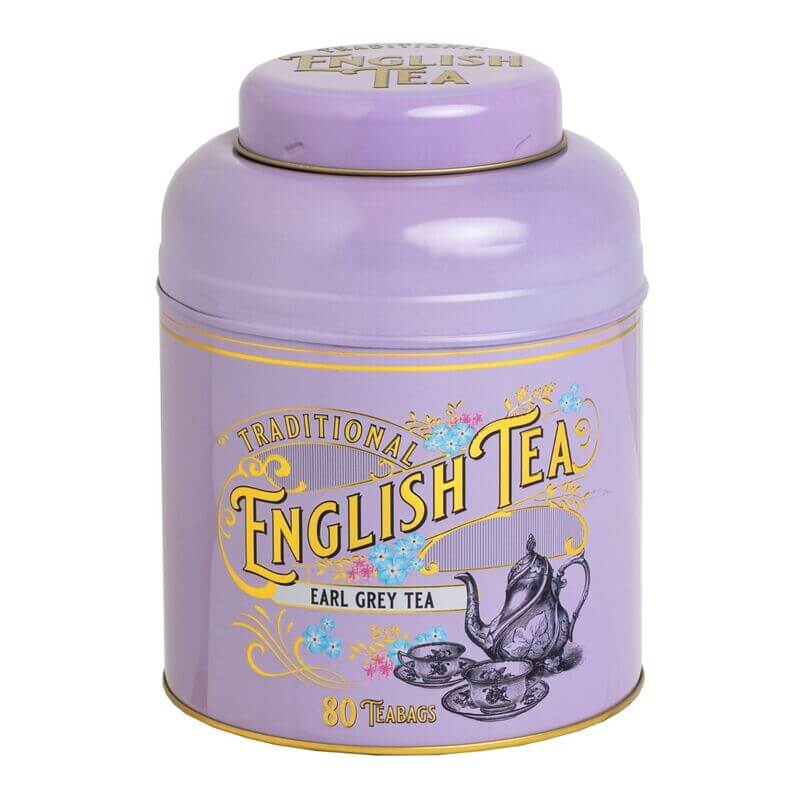 A vintage Victorian-style lilac tin titled "Vintage Victorian - 80 Teabag Tin - Earl Grey" showcases charming illustrations of a teapot and cup.