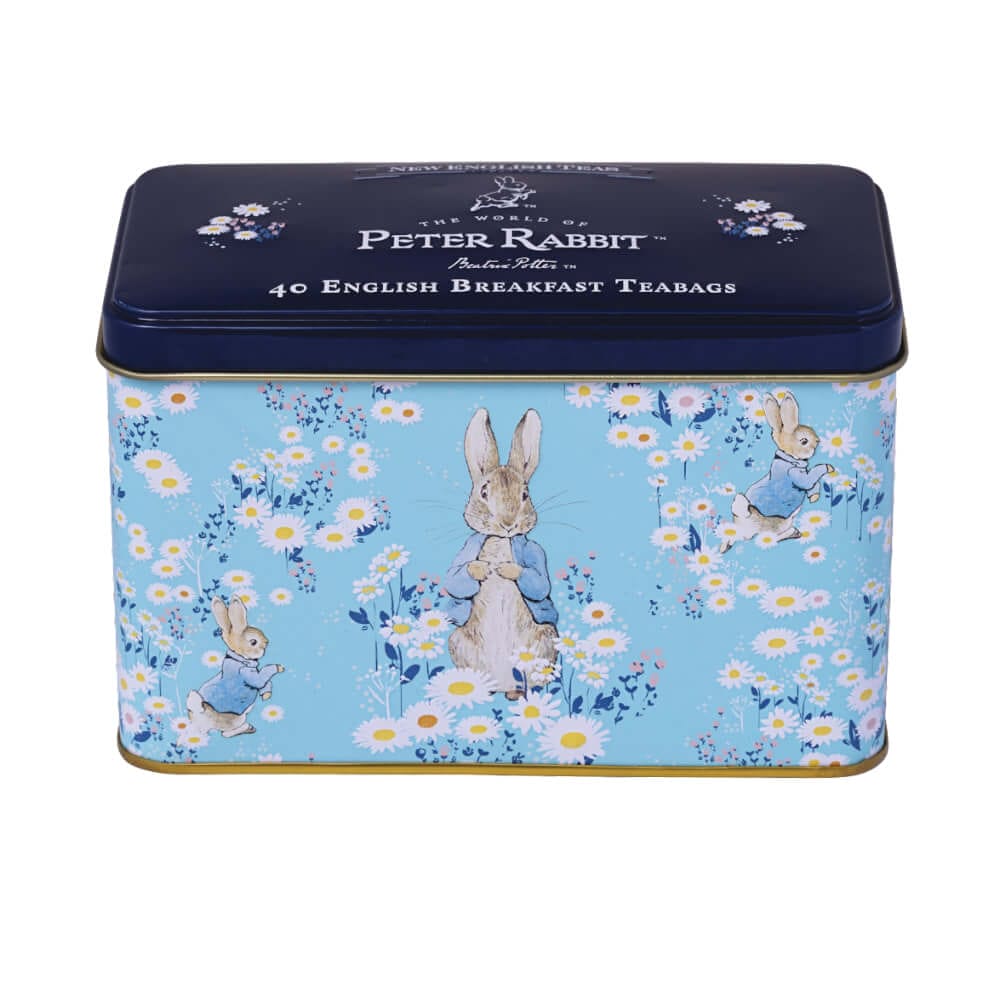 This decorative tin, named "Beatrix Potter - Daisies," features Peter Rabbit illustrations on a blue floral background and contains 40 English Breakfast teabags.